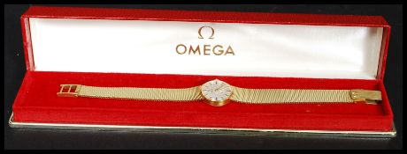 A ladies 14ct gold ladies Omega cocktail watch.