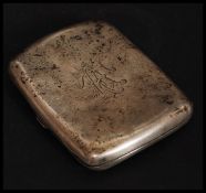 A Victorian silver hallmarked cigarette case with monogram to centre.