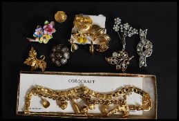 A collection of costume jewellery to include many items. Names such as corocraft.