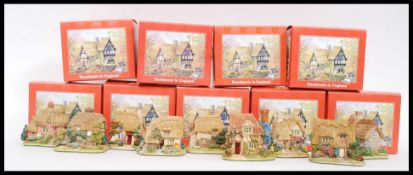 LILLIPUT LANE: A collection of 9x red box small Lilliput Lane ceramic cottages,