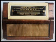 A vintage 1950's table top wooden cased radiogram by Regetone,