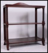 A 19th century mahogany inlaid dumbwaiter buffet.