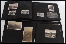 2 albums of black and white photograph albums one being entitled ' Scotland - A Holiday in the