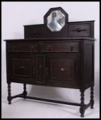 A 1930's oak barleytwist mirror back sideboard.