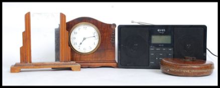 An early 20th century mahogany mantel clock with good French brass movement and enamel face ( case
