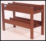 A 1970's Danish teak wood retro magazine rack - canterbury.