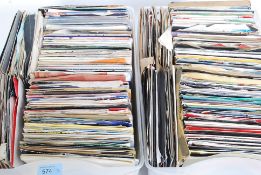 Two cases of several 45rpm vinyl record singles mainly from the 1980's consisting of various