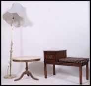 A 1950's retro mid century Onyx coffee table raised on a gilt metal base together with a matching