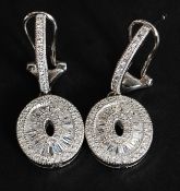 A modernist ladies pair of silver and CZ earrings. Total weight 4.7g.