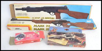 A collection of 5x original Edison toy cap guns - each within the original boxes.