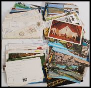 A collection of postcards mainly from the 20th century to include early black and white examples