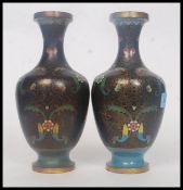 A pair of 19th century Chinese oriental cloisonne enamel bronze vases,