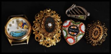 A Sterling silver Irish brooch in the form of a lyre - harp.