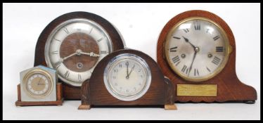 A collection of clocks to include  an HAC 8 day mantel clock with presentation plaque 1931,
