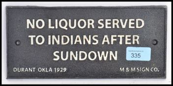 A vintage style reproduction metal sign ' No Liquor Served To Indians After Sundown '