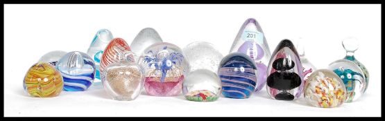 A collection of assorted vintage glass paperweights, x17 in total.