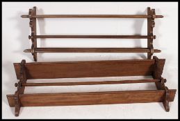 A pair of 20th century country beech wood wall shelves,