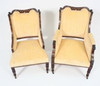 A Pair of ( 2 ) Victorian rosewood, mahogany and marquetry inlaid salon armchairs.