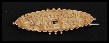 A 9ct gold vintage ladies Forget Me Not - sweetheart brooch, stamped 9ct gold. Total weight 2.