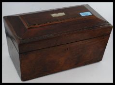 A good large 19th century rosewood sarcophagus shaped tea caddy.