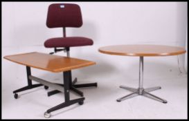 A collection of retro furniture to include a circular chrome and faux wood coffee table,