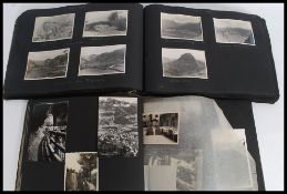 An early 20th century black and white photograph album to include scenes from 1940 in the Lake