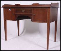 An Edwardian mahogany writing table desk.
