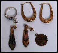 A 9ct gold st Christopher pendant together with a pair of 9ct gold creole earrings,