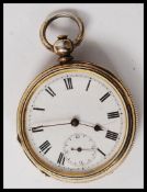 A white metal ( marked ' fine silver ' ) enamel faced pocket watch.