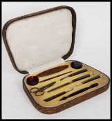 Early 20th century tortoiseshell manicure set, within the original case.