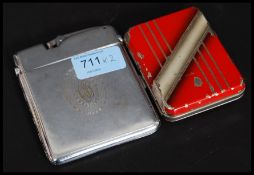 A Ronson cigarette case and lighter combo along with a ladies compact cigarette case combo.