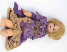 ARMAND MARSEILLE: An antique small bisque headed 390 A&M Armand Marseille doll.