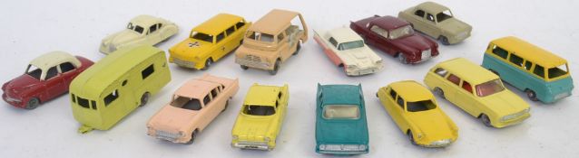 LESNEY: A collection of 14x Matchbox Lesney unboxed diecast model cars - most with gray plastic