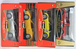 BURAGO 1:18: A collection of 4x 1:18 scale Burago diecast model cars - each within the original