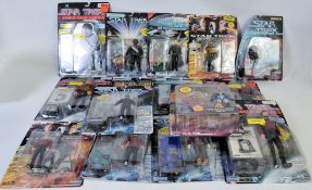 STAR TREK; A collection of 15x assorted Star Trek carded action figures by Playmates.