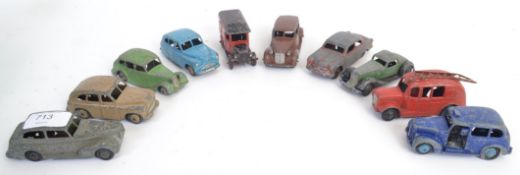 DINKY: A collection of 10x loose assorted early Dinky diecast model cars - to include Ford Sedan,