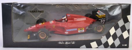 1:18 SCALE: An original Pauls Model Art ( Minichamps ) 1:18 scale diecast model Grand Prix Ferrari,
