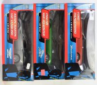 JAMES BOND: A collection of 3x James Bond 1:18 scale diecast model cars - each within the original