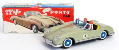 TIN SPORTS CAR: A vintage Made In China tinplate friction powered 1970's ' Sports Car ' - VGC,