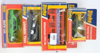 DINKY: A collection of vintage boxed and unpunched Dinky Toys - each within the original blue and