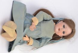 ARMAND MARSEILLE: An antique bisque headed composition bodied German made doll by Armand Marseille.