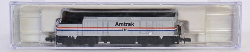 LIFE LIKE TRAINS; An original Life Like Trains N Gauge 7641 Amtrak railway trainset locomotive.