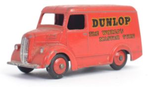 DINKY: An original vintage Dinky Toys diecast model Trojan Dunlop ' The Worlds Master Tyre'