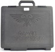 WARHAMMER: An original Games Workshop plastic carry briefcase containing a quantity of assorted