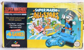SUPER NINTENDO: An original retro Super Nintendo Super Mario Allstars boxed games console SNES