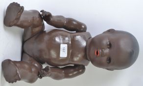 ARMAND MARSEILLE; An antique A&M Armand Marseille black doll - with composition head and body,