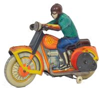 TINPLATE MOTORCYCLE: A good vintage tinplate clockwork motorcycle model.