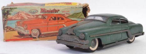 MINISTER TINPLATE: An original vintage Minister Delux tinplate friction powered car, in green.