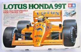 TAMIYA: An original vintage Tamiya 1:10 scale model car kit - Lotus Honda 99T - appears to be