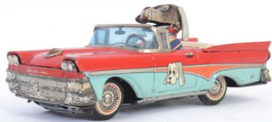 ALPS TINPLATE: An original vintage Alps tinplate ' Made In Japan ' friction powered Happy Pup car.